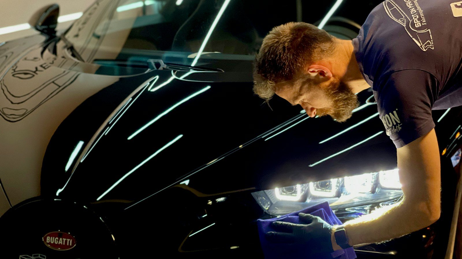 Car detailing work illustrating paint preparation before wax protection
